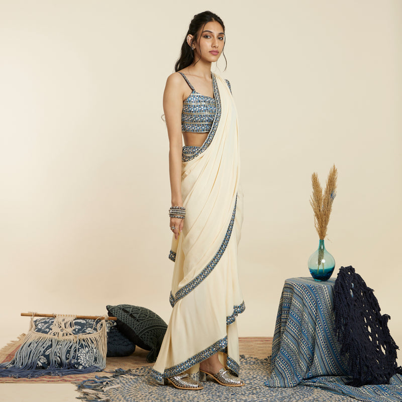 BEIGE CASCADE SAREE PAIRED WITH EMBELLISHED BUSTIER