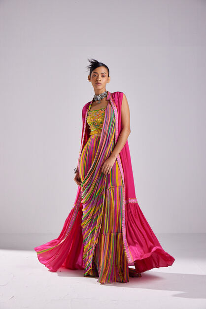 YELLOW FLOWERS DETAILED BLOUSE WITH PINK STRIPE GHARARA SAREE WITH FUSCHIA PINK  CAPE