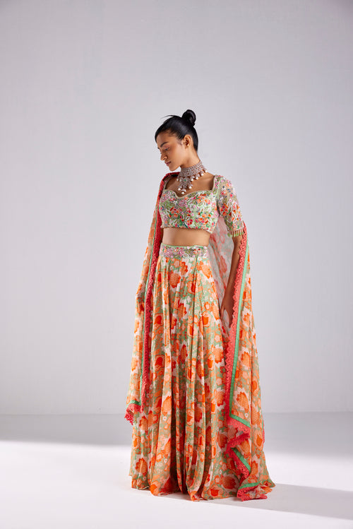 MINT GREEN FLORAL MIX MATERIAL EMBROIDERED TASSEL DETAILED BLOUSE WITHBEMBROIDERED BELT DETAILED MINT GREEN FLORAL JAAL PRINTED SKIRT AND DUPATTA