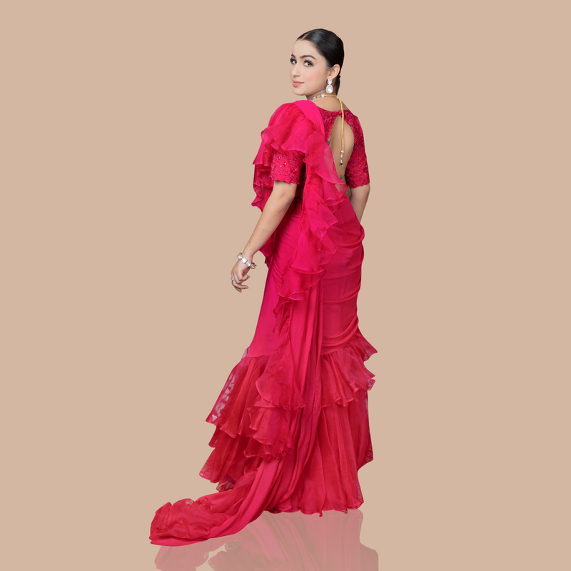 Rani pink drape saree with ruffles and blouse