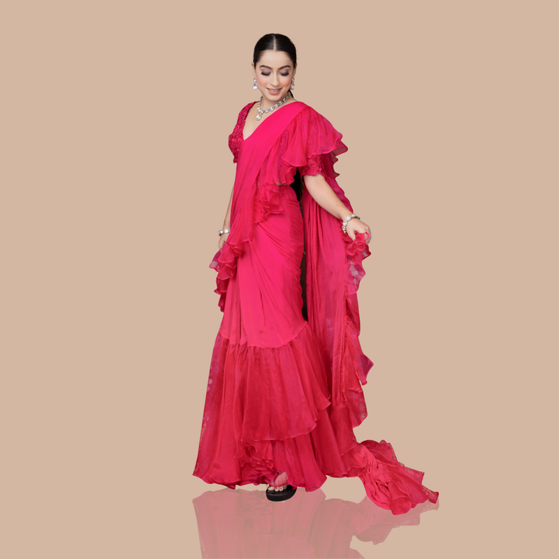 Rani pink drape saree with ruffles and blouse