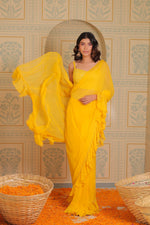 Yellow drape saree with blouse and belt