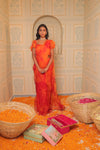 Orange tiedye drape saree with blouse