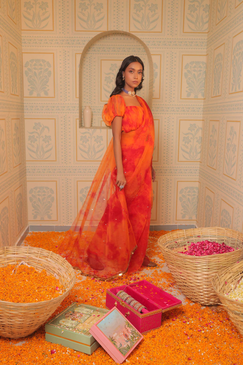 Orange tiedye drape saree with blouse