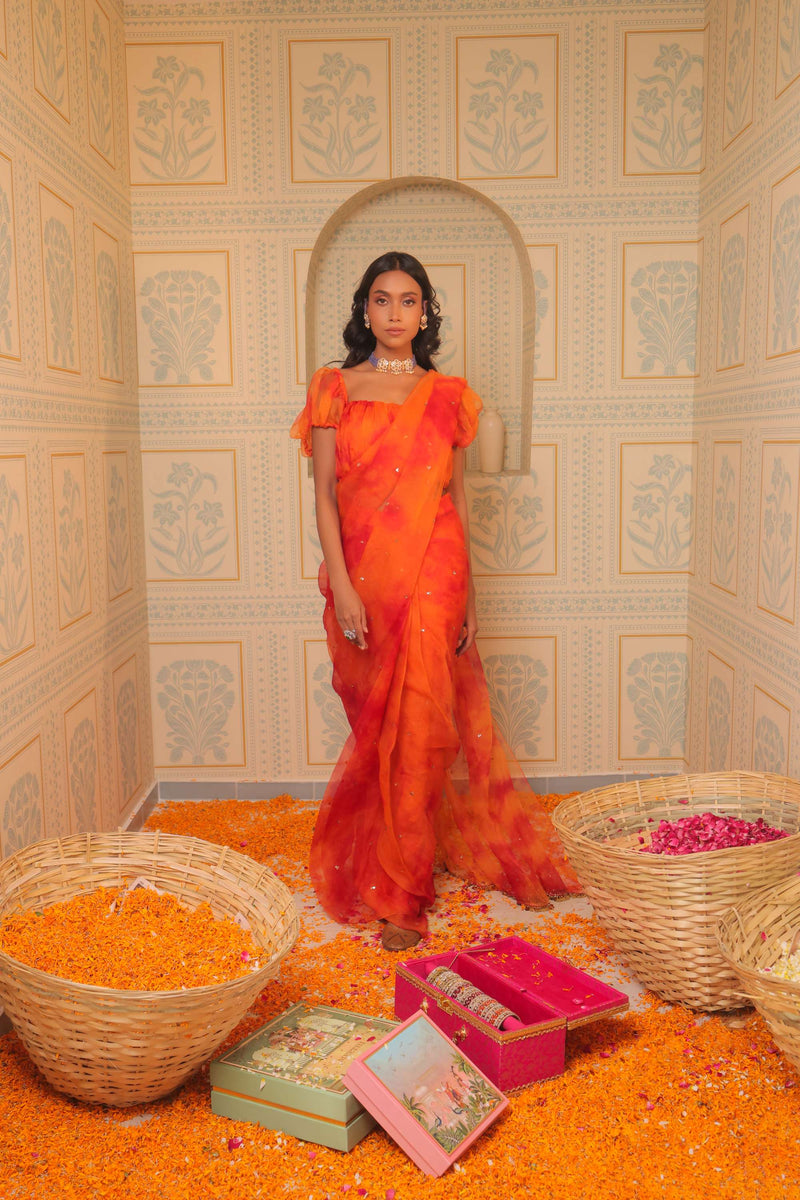 Orange tiedye drape saree with blouse