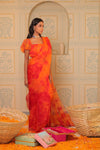 Orange tiedye drape saree with blouse