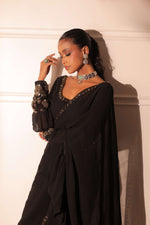 Black ruffle drape saree and blouse with belt