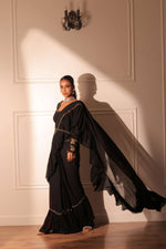 Black ruffle drape saree and blouse with belt