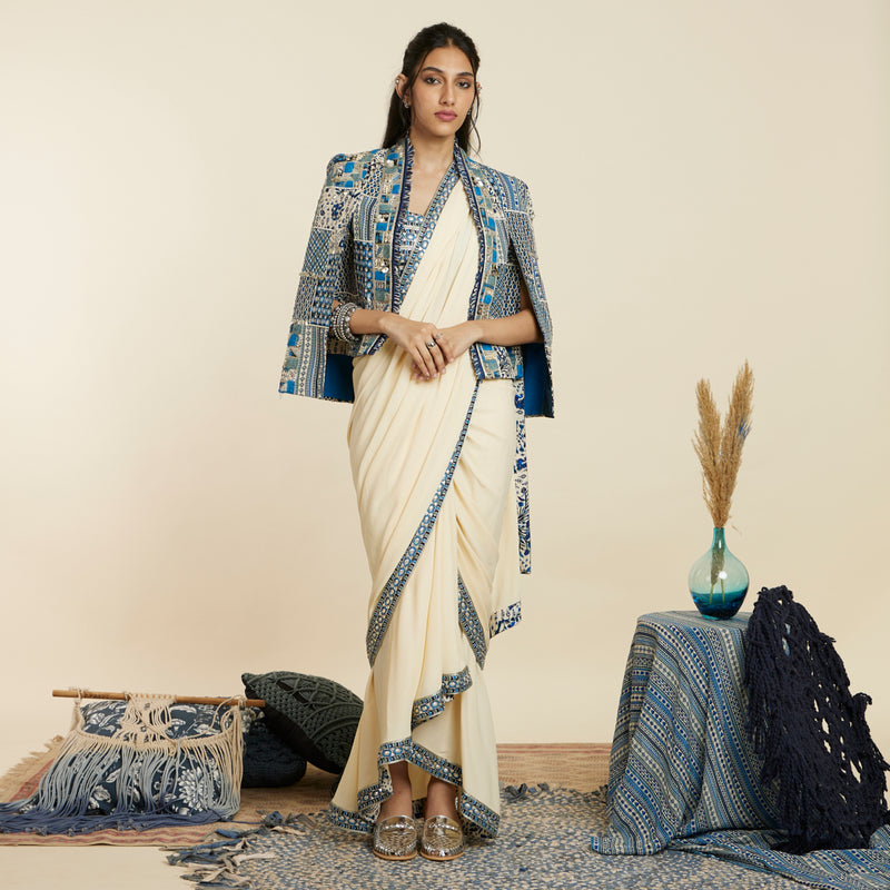 BEIGE CASCADE SAREE WITH  BUSTIER AND NOOR JACKET