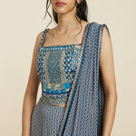 CROP-TOP TEAMED WITH BLUE GEO DRAPE SKIRT AND DRAPE