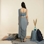 CROP-TOP TEAMED WITH BLUE GEO DRAPE SKIRT AND DRAPE