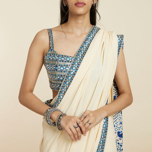 BEIGE CASCADE SAREE PAIRED WITH EMBELLISHED BUSTIER