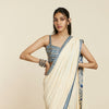 BEIGE CASCADE SAREE PAIRED WITH EMBELLISHED BUSTIER