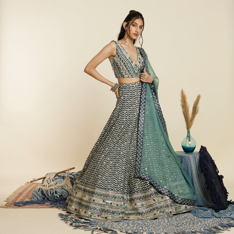 BLUE SCALLOP BRIDAL LEHENGA WITH  BUSTIER AND DUPATTA