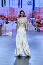 NOOR JACKET PAIRED WITH EMBELLISHED BUSTIER AND PLEATED PANTS