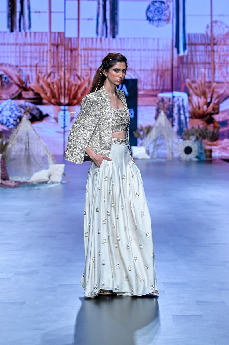 NOOR JACKET PAIRED WITH EMBELLISHED BUSTIER AND PLEATED PANTS