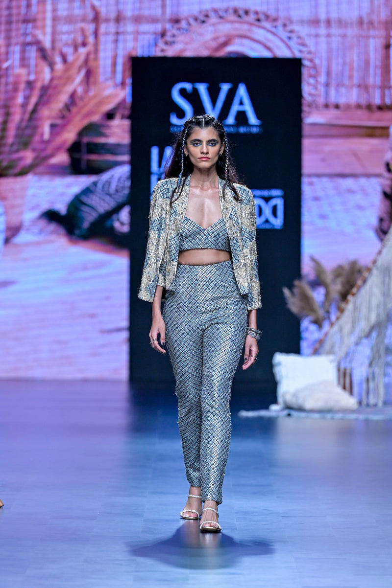 METAL JACKET PAIRED WITH EMBELLISHED BUSTIER AND  PANTS