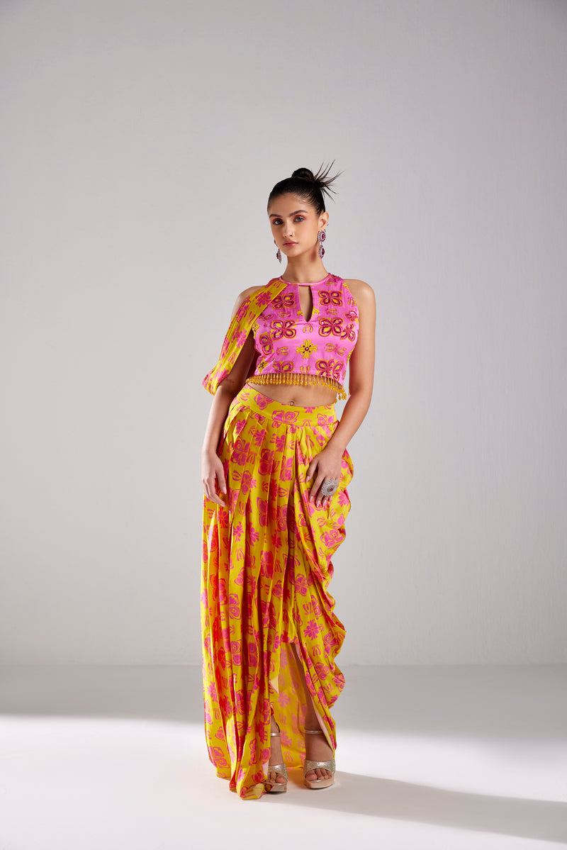 FUSCHIA PINK HIGH NECK CROP TOP AND YELLOW COWL WITH YELLOW  DHOTI SKIRT