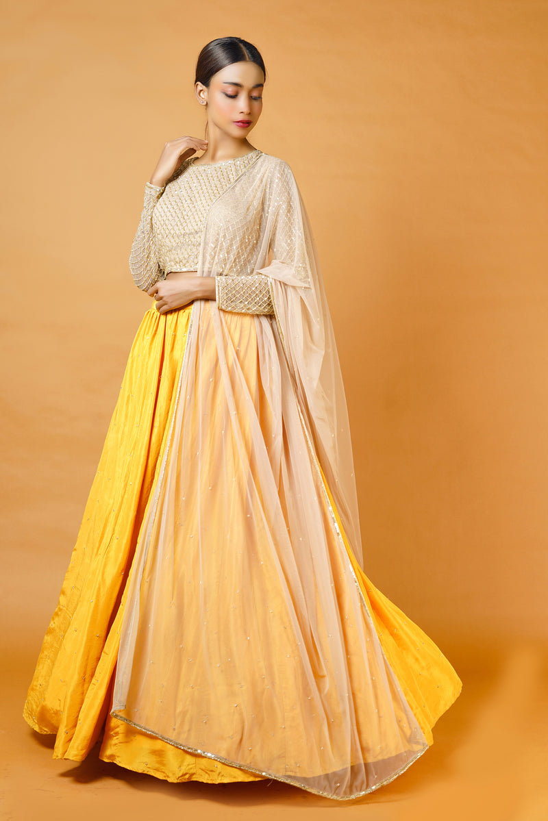 Gold blouse and dupatta with fire yellow lehenga