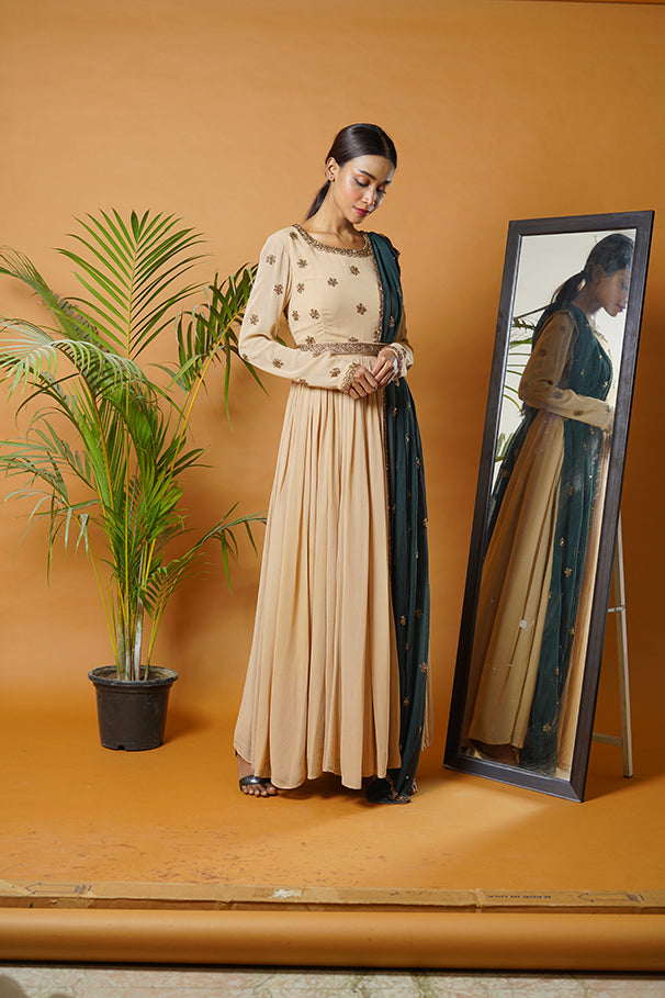 Beige anarkali suit and waistbelt with green dupatta