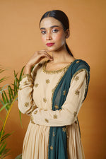 Beige anarkali suit and waistbelt with green dupatta