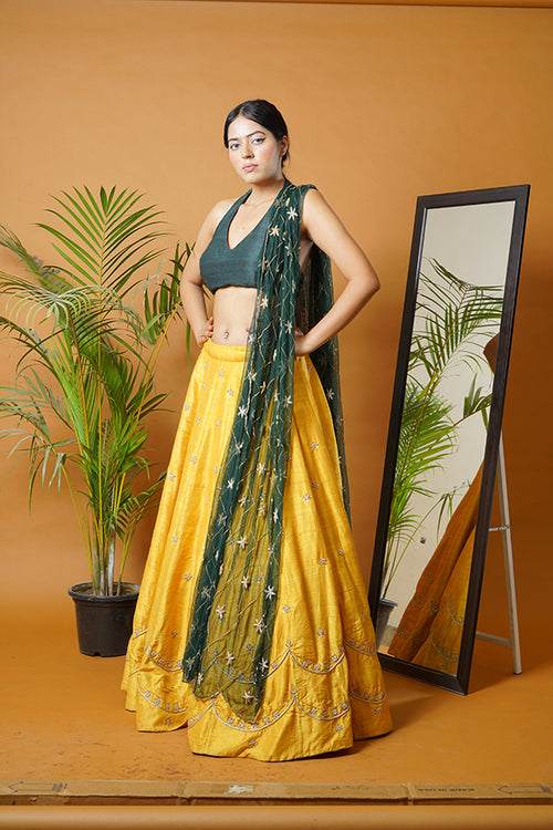 Green blouse and dupatta with mustard lehenga