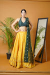 Green blouse and dupatta with mustard lehenga