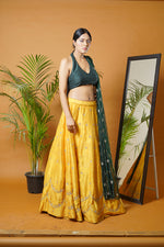 Green blouse and dupatta with mustard lehenga