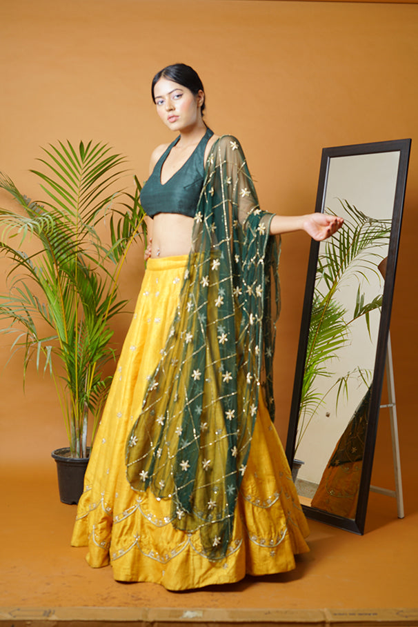 Green blouse and dupatta with mustard lehenga