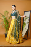 Green blouse and dupatta with mustard lehenga