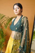 Green blouse and dupatta with mustard lehenga