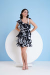 BLACK PRINTED TIERED DRESS WITH CASCADE DETAIL