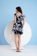 BLACK PRINTED TIERED DRESS WITH CASCADE DETAIL