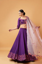 VIOLET LEHENGA WITH INTRICATE HANDWORK PAIRED  WITH A  PINK DUPATTA