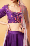 VIOLET LEHENGA WITH INTRICATE HANDWORK PAIRED  WITH A  PINK DUPATTA