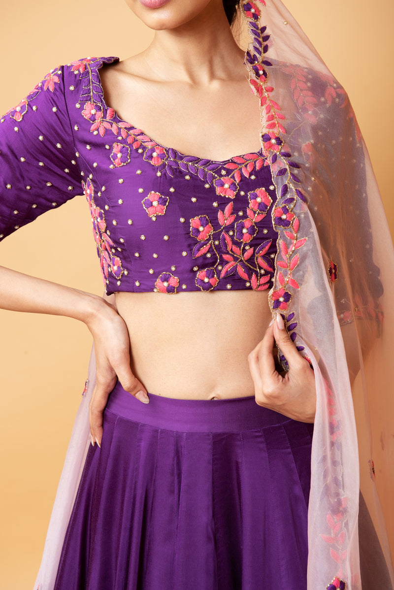 VIOLET LEHENGA WITH INTRICATE HANDWORK PAIRED  WITH A  PINK DUPATTA