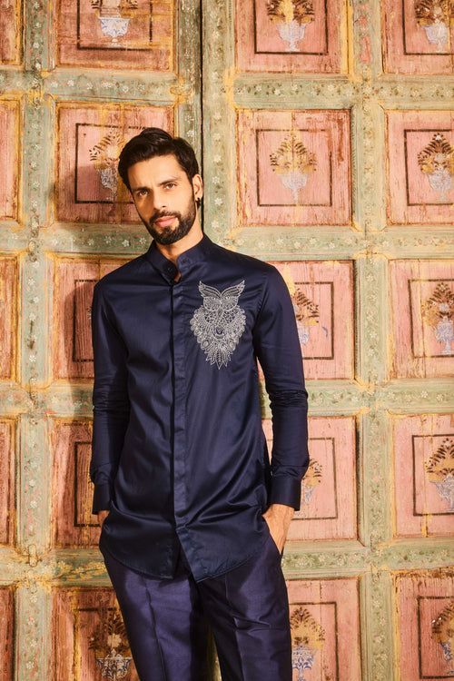 Dark blue embroidered shirt and black pant