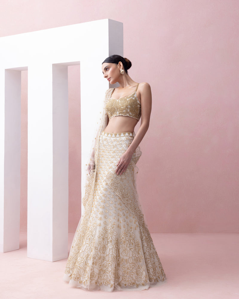 IVORY AND GOLD FISHTAIL LEHENGA SET WITH ORGANZA APPLIQUE AND CRYSTALS