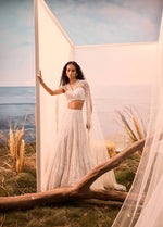 Ivory thread work lehenga with corset blouse and dupatta