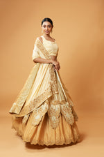 GOLDEN OMBRE LEHENGA WITH INTRICATE EMBROIDERY