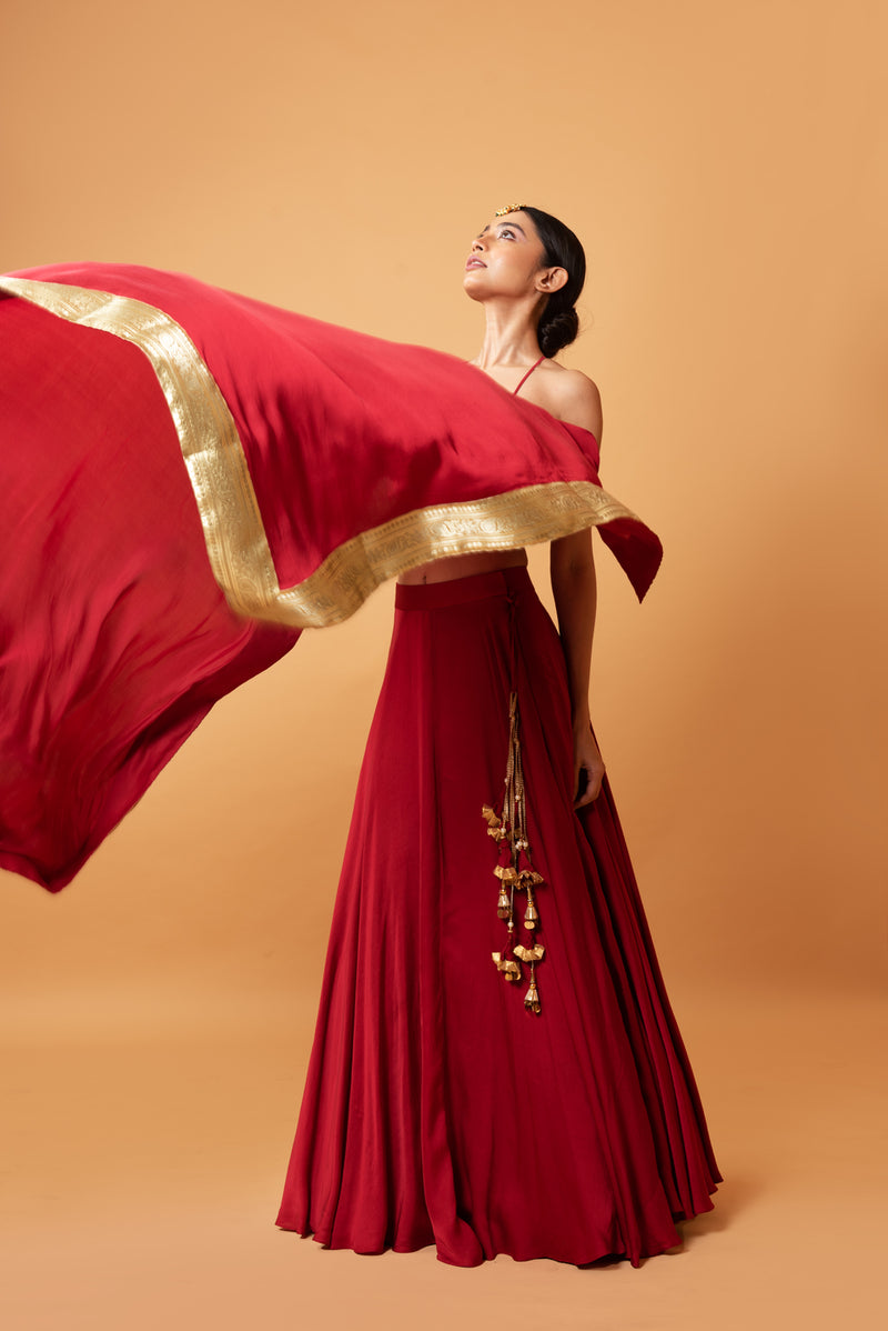 DEEP RED COLOURED SLEEVELESS LEHENGA.