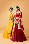 DEEP RED COLOURED SLEEVELESS LEHENGA.