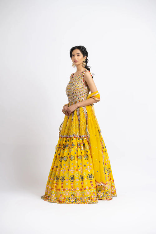 VIBRANT YELLOW PEPLUM LEHENGA SET WITH MULTICOLUR WORK