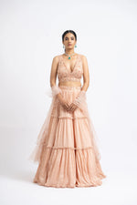 PEACH CRUSHED CHIGNON TIERED LEHENGA