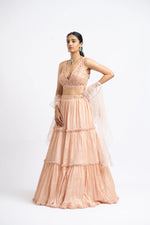 PEACH CRUSHED CHIGNON TIERED LEHENGA