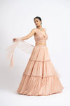 PEACH CRUSHED CHIGNON TIERED LEHENGA