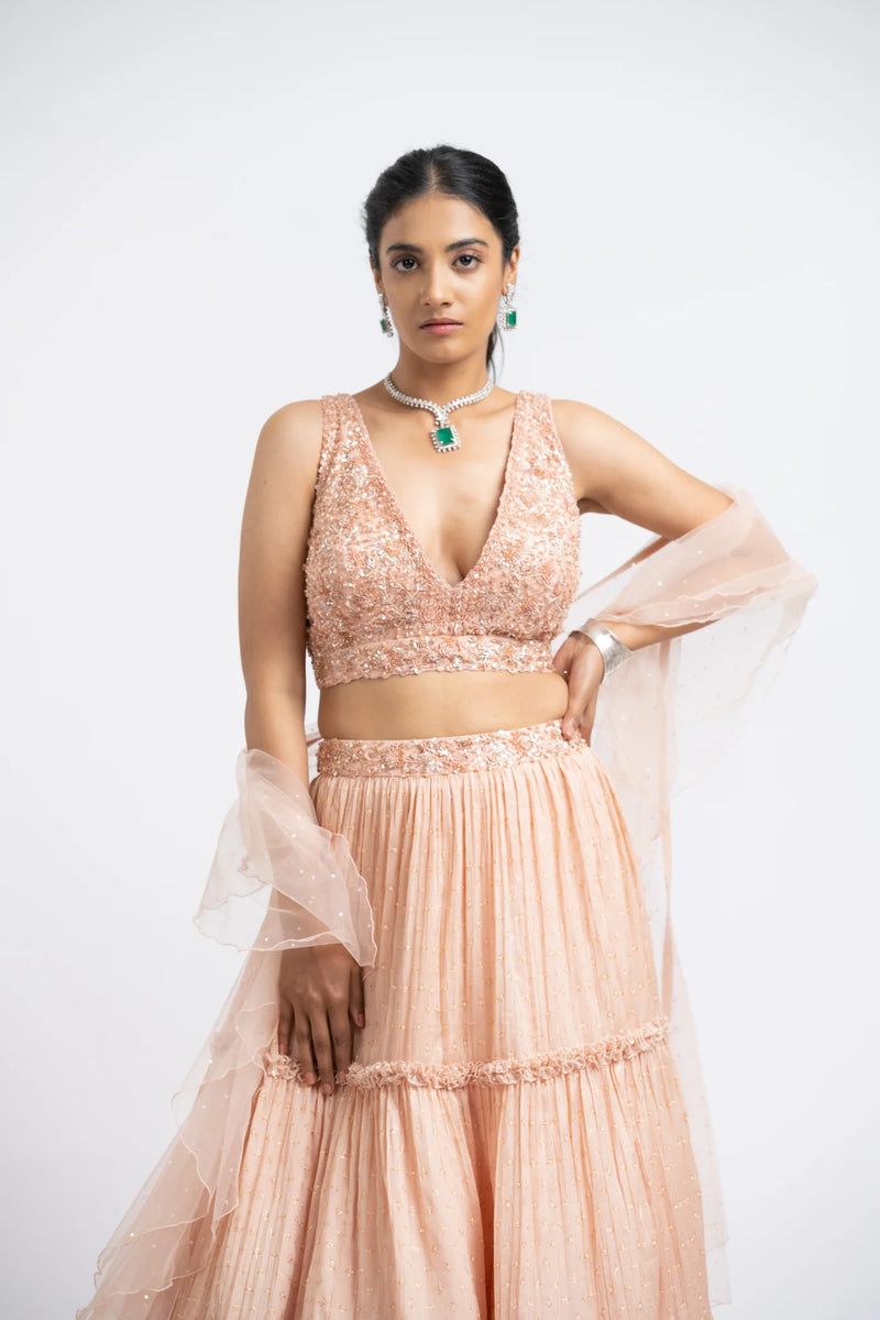 PEACH CRUSHED CHIGNON TIERED LEHENGA