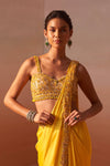 YELLOW DRAPED SAREE WITH NUDE CHOLI