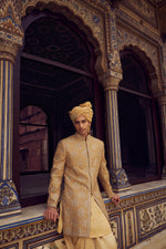 GOLD RAW SILK SHORT SHERWANI WITH A SATIN KURTA AND DHOTI