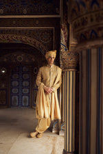 GOLD RAW SILK SHORT SHERWANI WITH A SATIN KURTA AND DHOTI